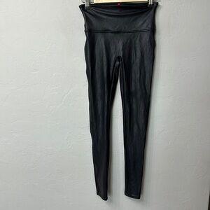 Spanx black faux leather leggings size medium.